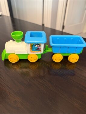Sesame Street Colorful Green & Blue Kids Toy Train - Classic Pull-Along Engine